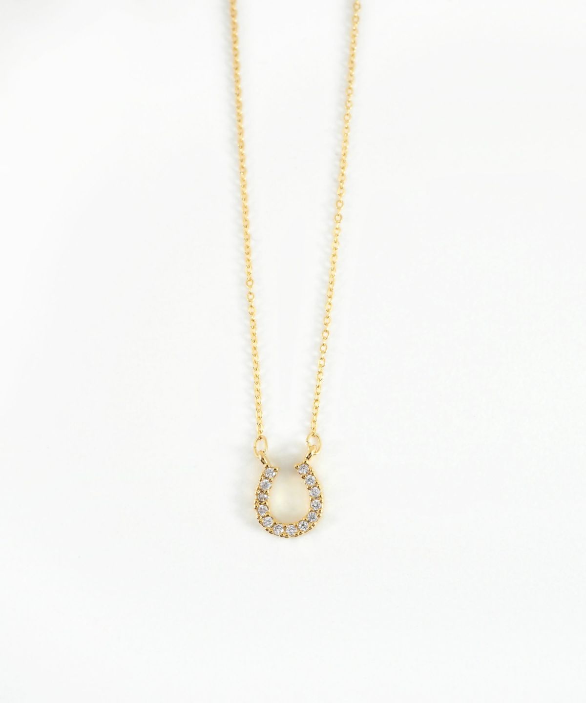 グリームホースシューキュービックジルコニアプチペンダント【MUK】