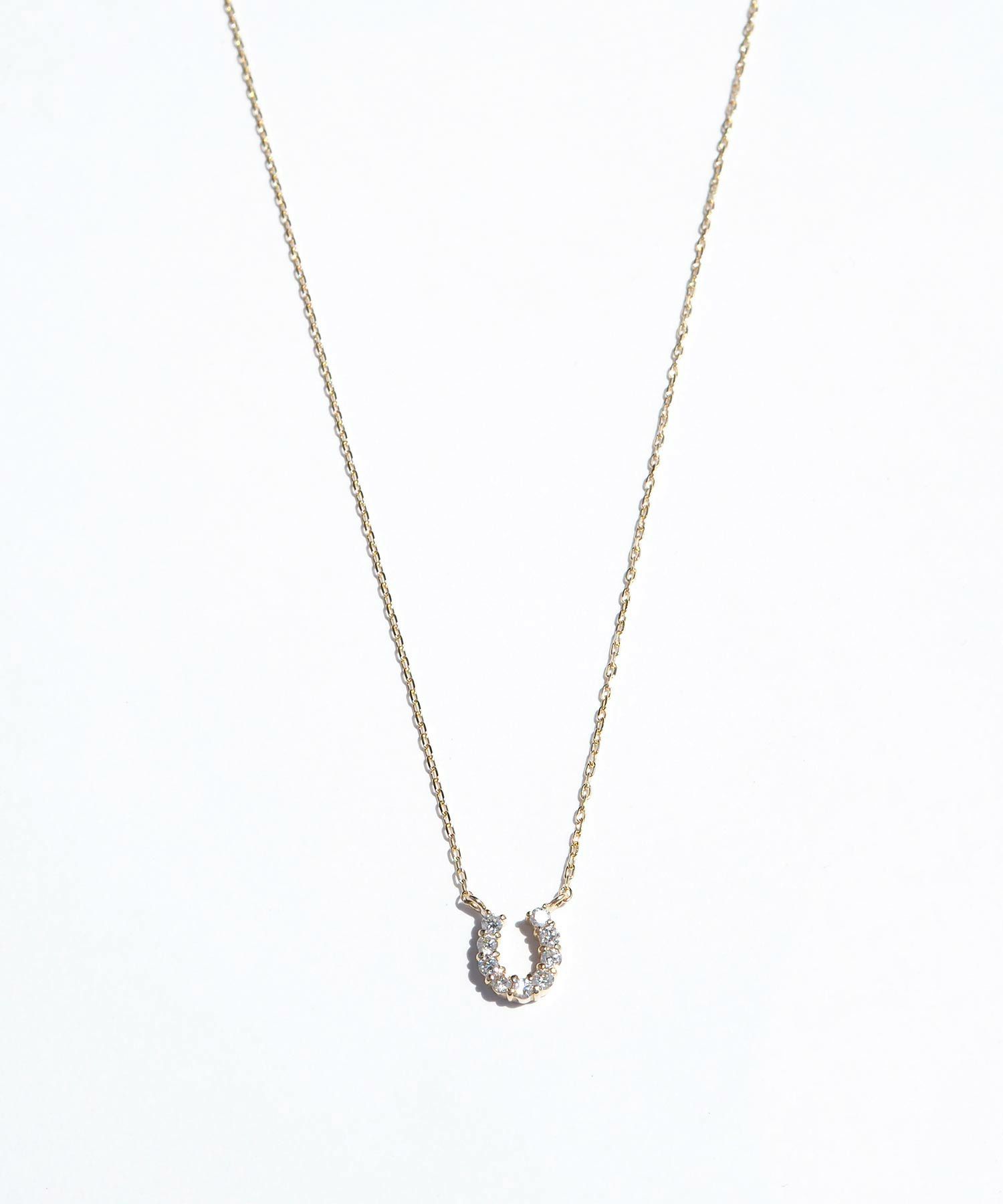 [K10]タイニーホースシューパヴェダイヤモンドプチペンダント【cucia】