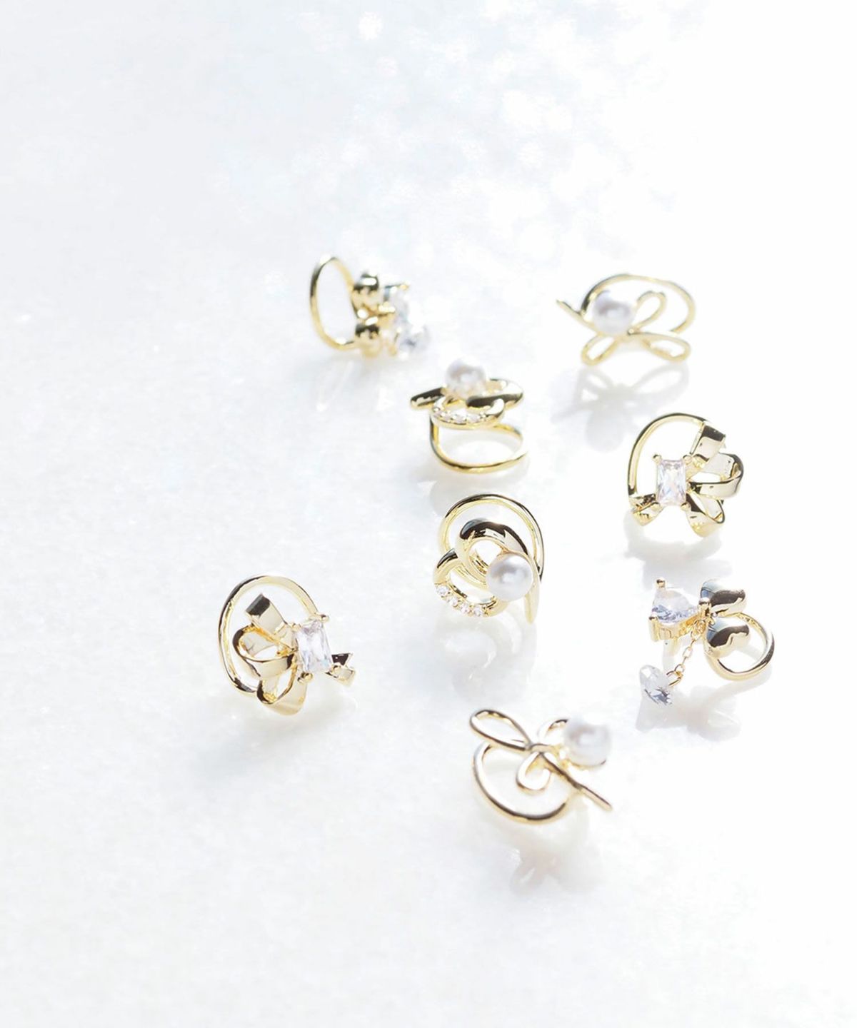 ミツバビジューラウンドメタルイヤリング