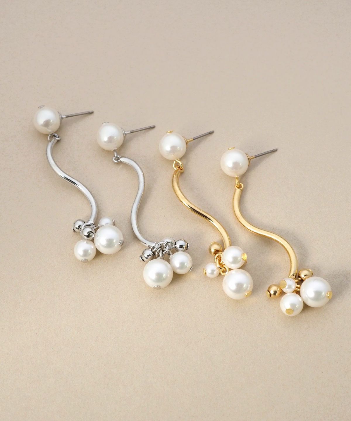 パールウエーブチタンポストピアス【MUK voyalibre】