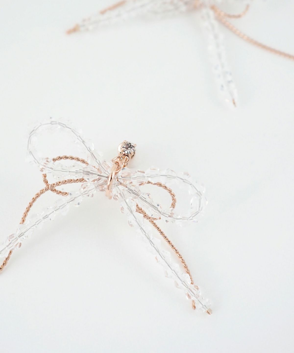 ダブルリボンビーズIMFスプリングイヤリング