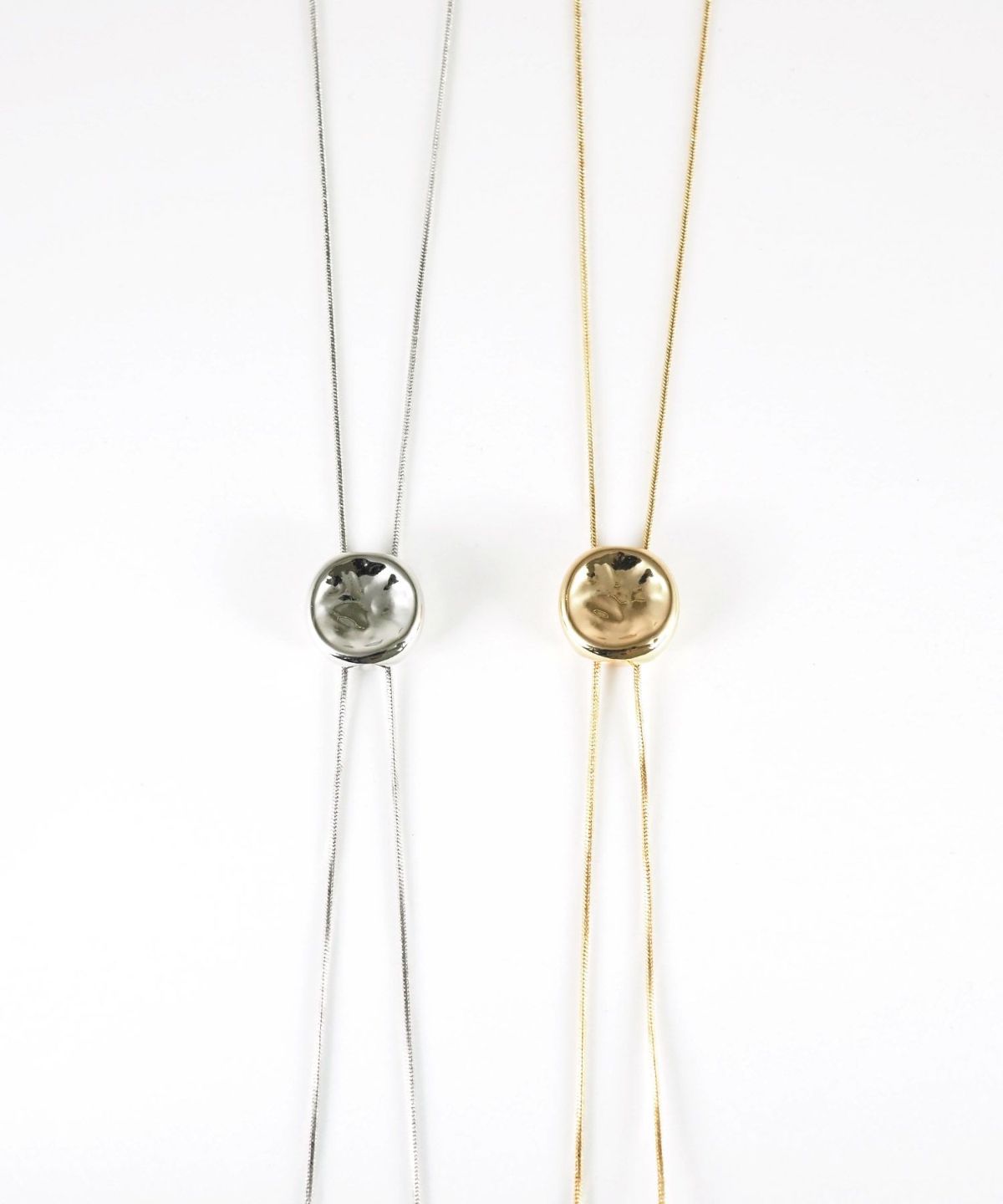 ラウンドプレートループタイネックレス