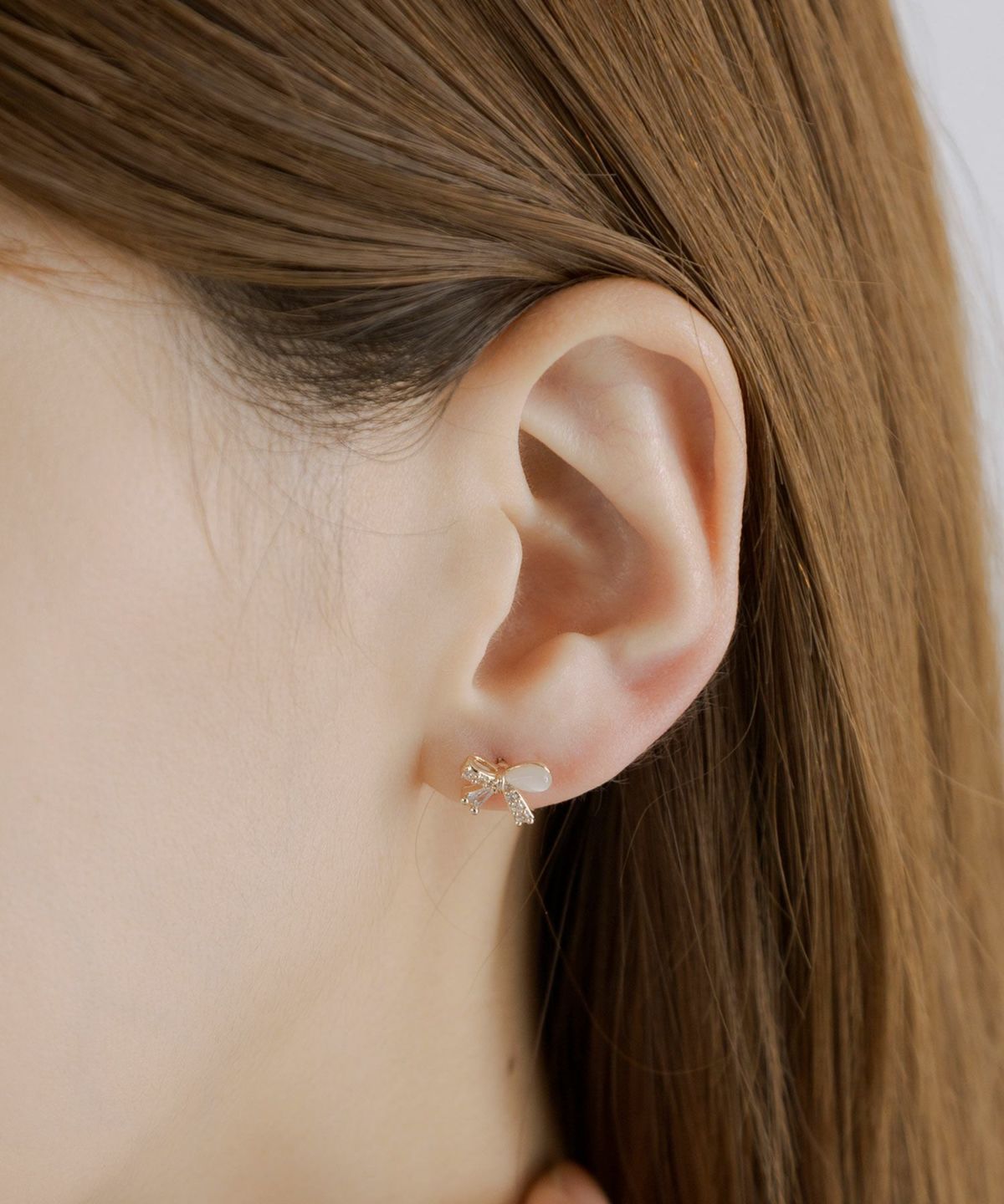 アシンメトリーリボンキャッツアイチタンポストピアス | 【公式】MUK