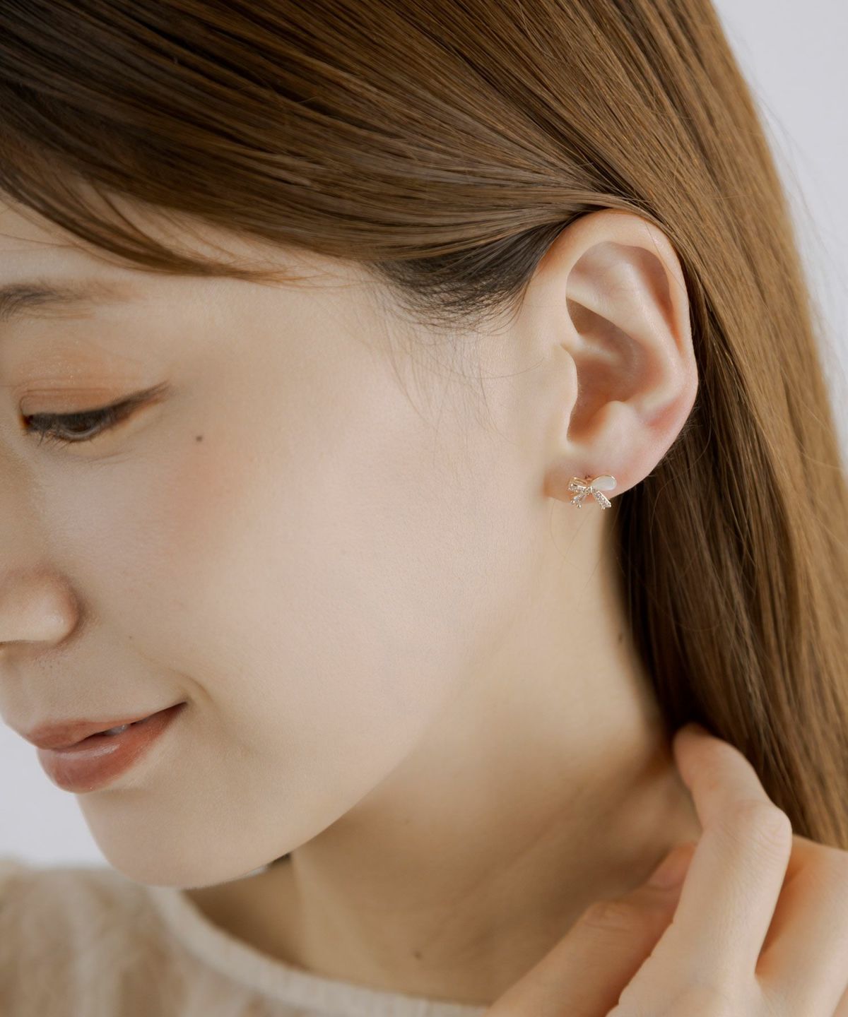 アシンメトリーリボンキャッツアイチタンポストピアス