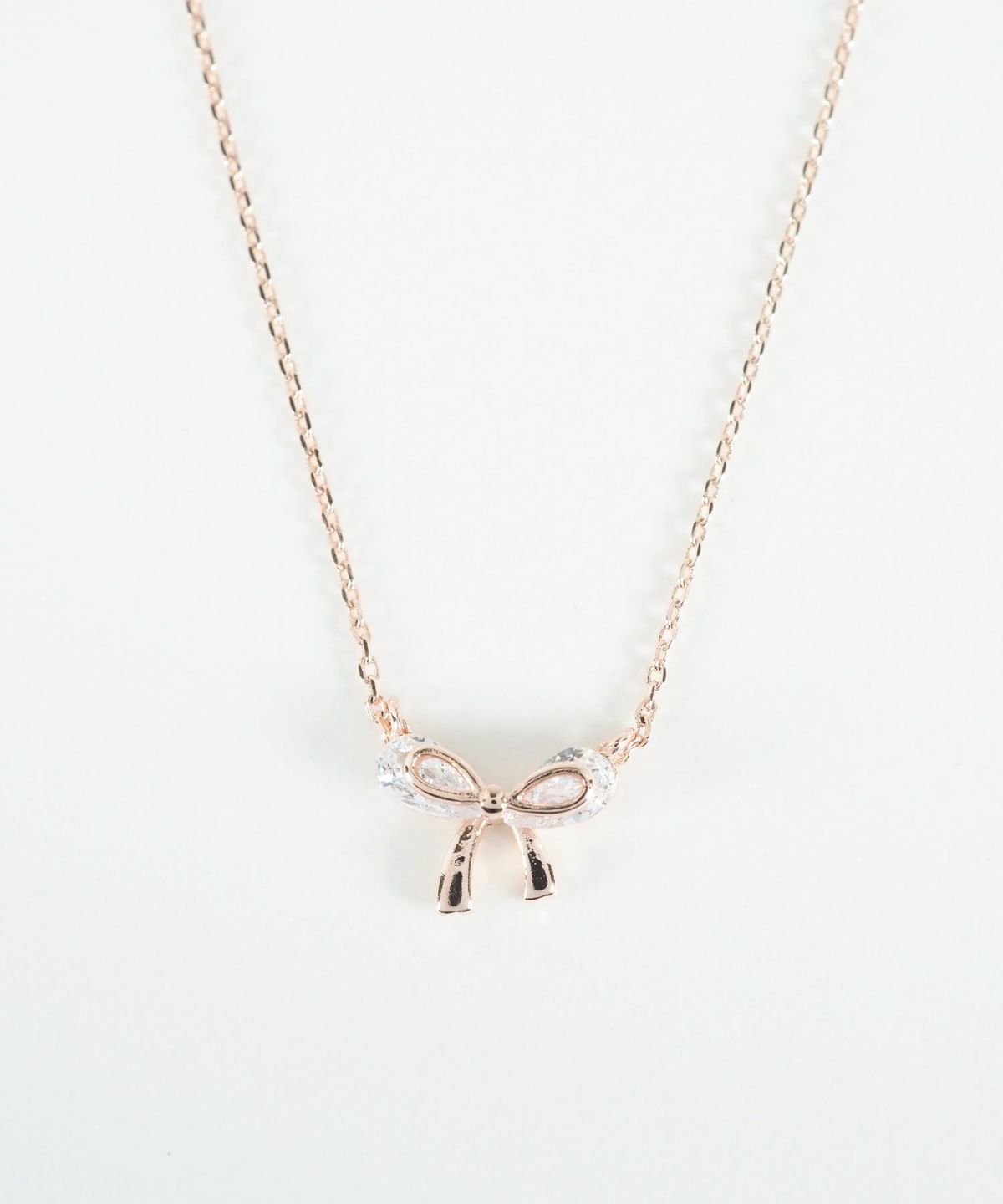 キュービックメタリックリボンネックレス