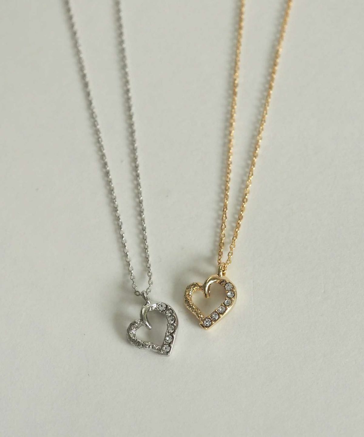 スランティングハートプチペンダント【MUK petite charme】