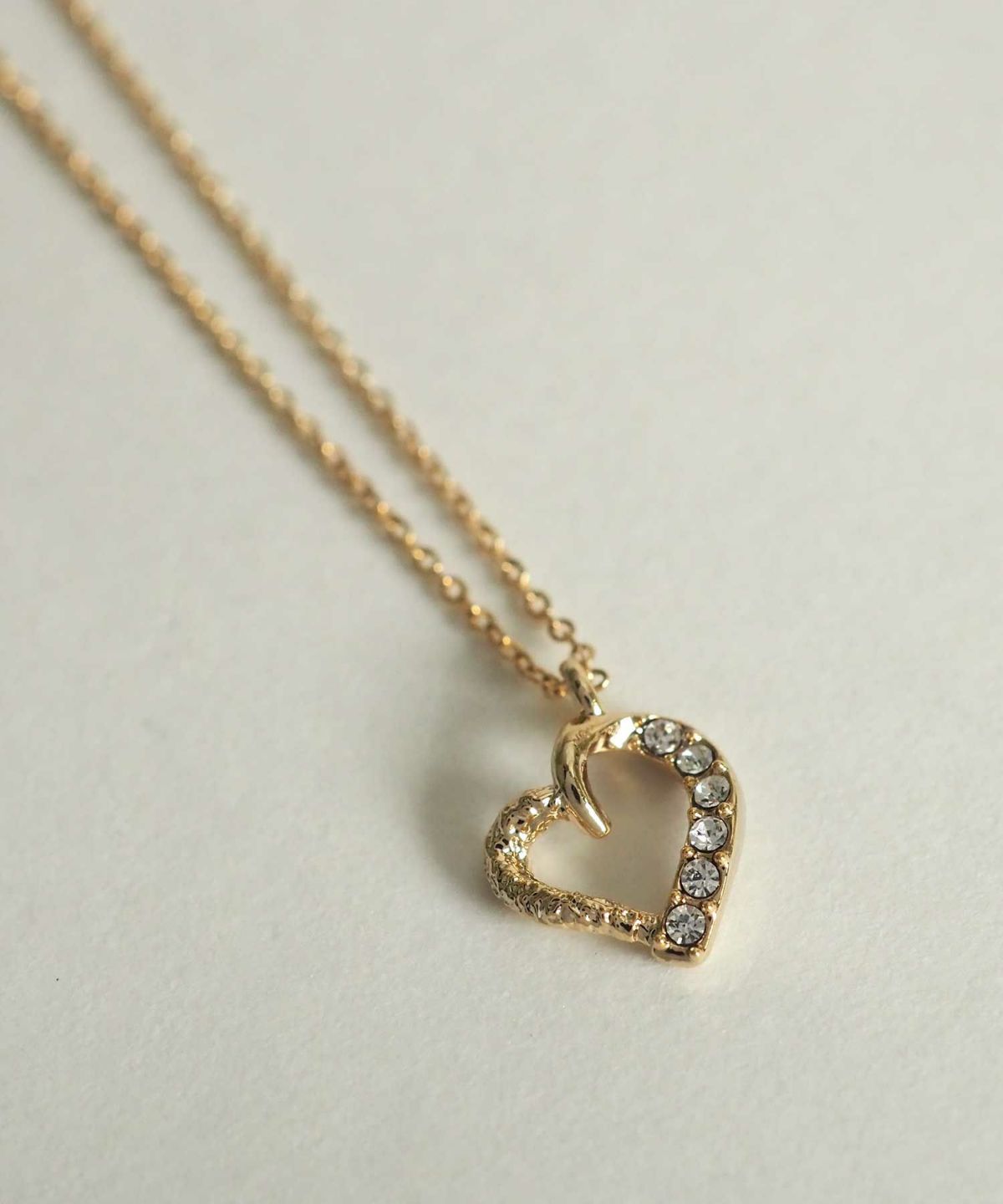 スランティングハートプチペンダント【MUK petite charme】