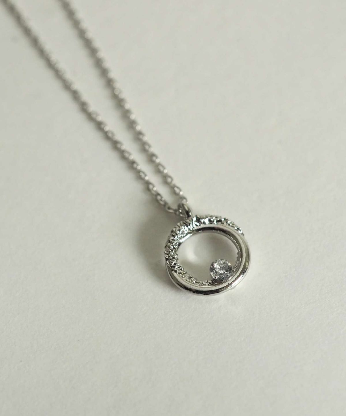 サークルストーンプチペンダント【MUK petite charme】