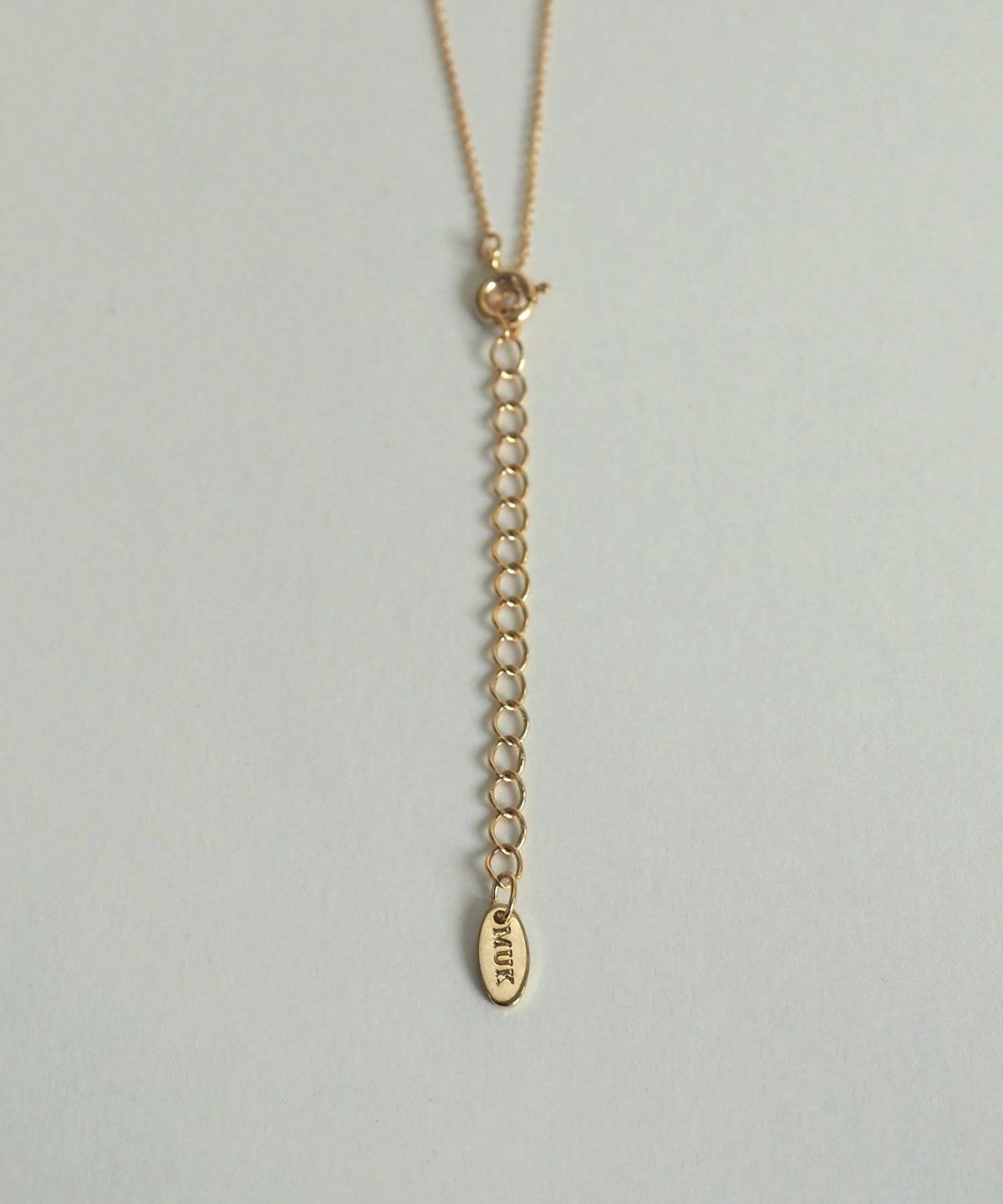 サークルストーンプチペンダント【MUK petite charme】