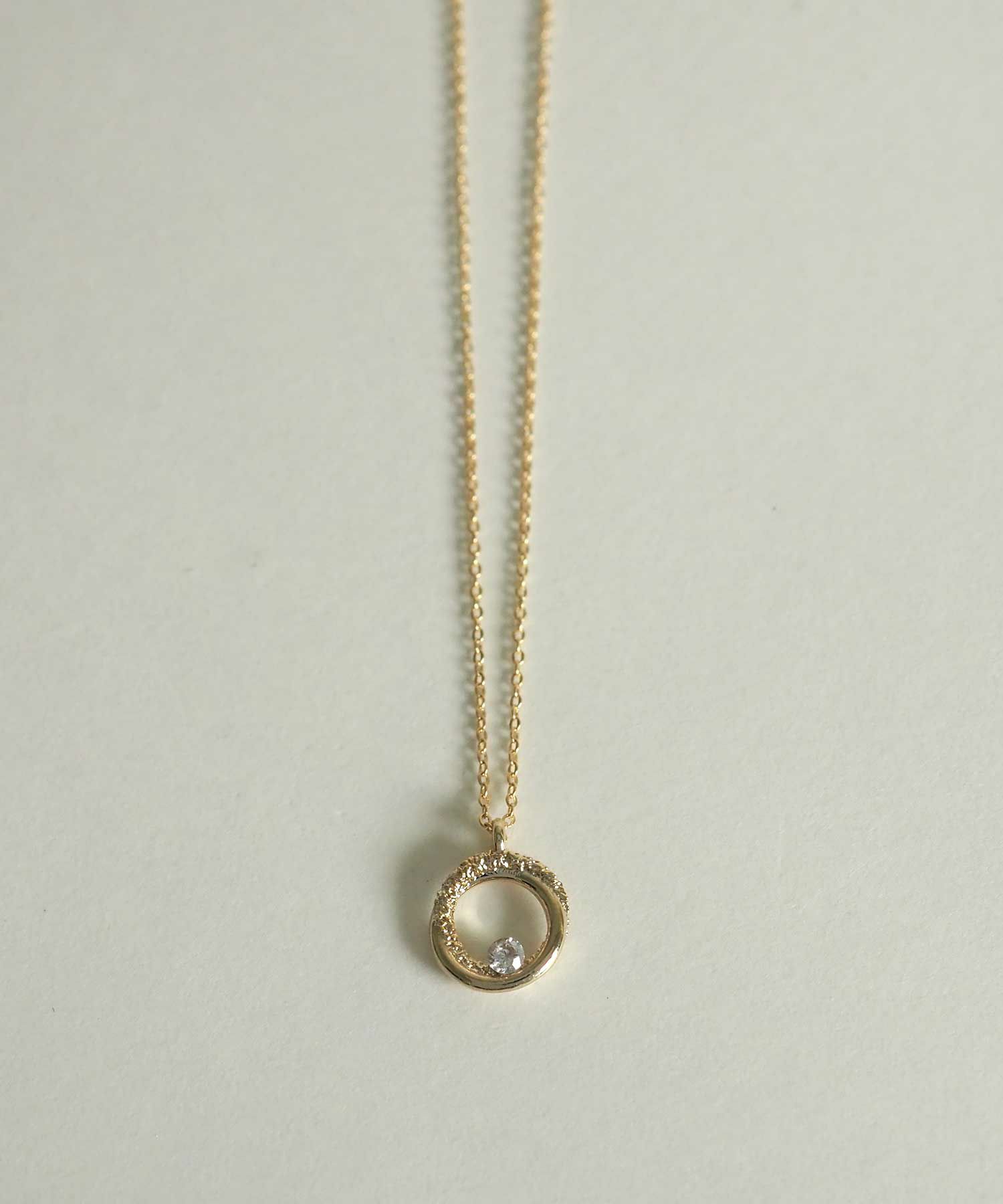 サークルストーンプチペンダント【MUK petite charme】