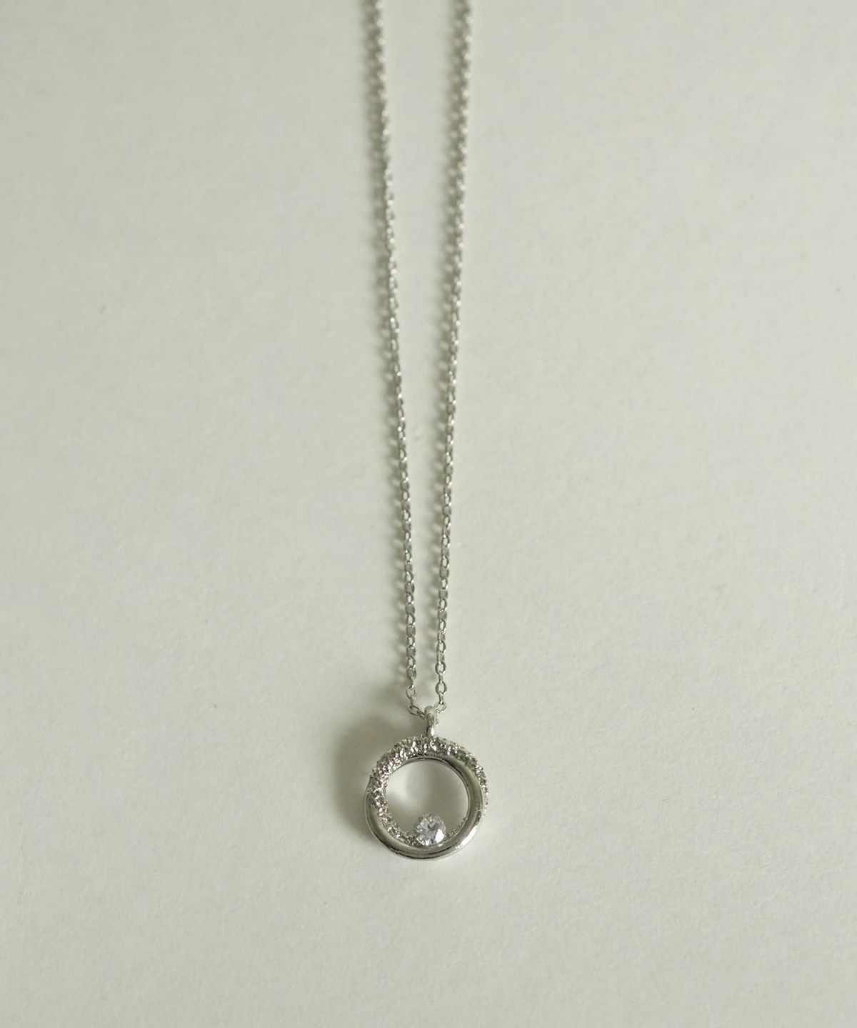 サークルストーンプチペンダント【MUK petite charme】